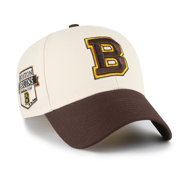 Pictured is this NHL Boston Bruins Sure Shot ’47 MVP cap in natural. 1