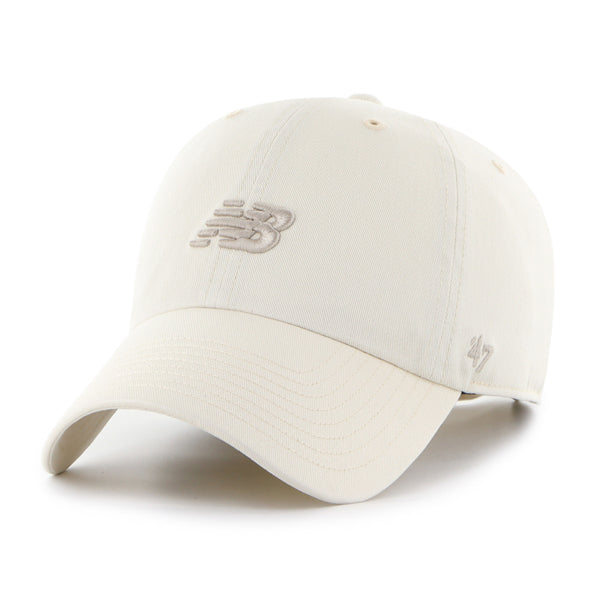 Pictured is this New Balance Core ’47 CLEAN UP cap in cream. 1
