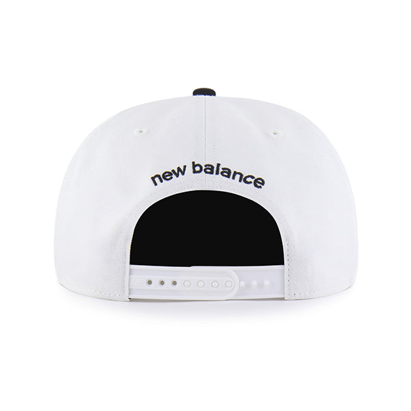 Pictured is this New Balance Arch Suede ’47 CAPTAIN RL cap in white & black. 2