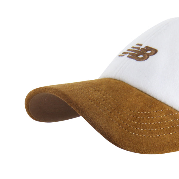 Pictured is this New Balance Wool Suede ’47 CLEAN UP cap in white. 3