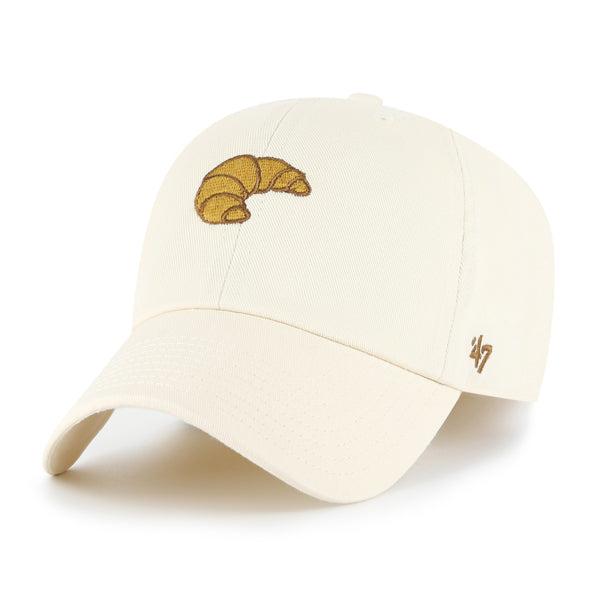 Pictured is this Food Icon Croissant Base Runner ’47 CLEAN UP cap in natural. 1