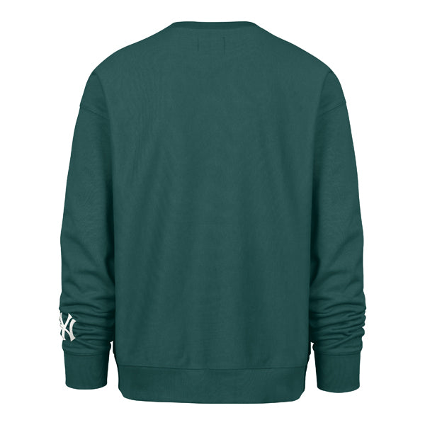 The model is wearing this MLB New York Yankees Buttress ’47 Foundation Crewneck Sweatshirt in green. 2