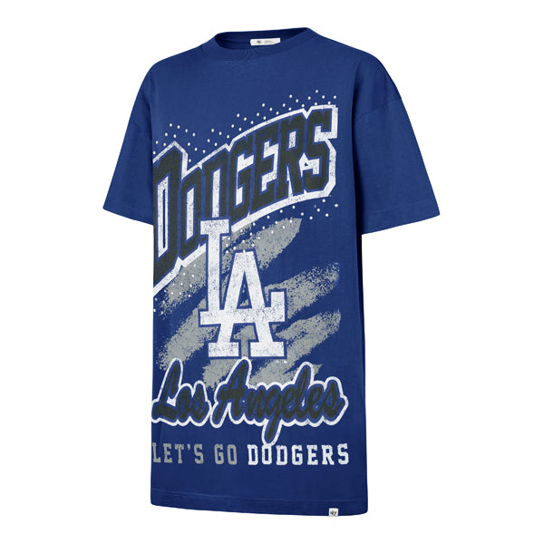 The model is wearing this MLB Los Angeles Dodgers Womens Gemstone Swash ’47 T-Shirt Dress in blue. 1