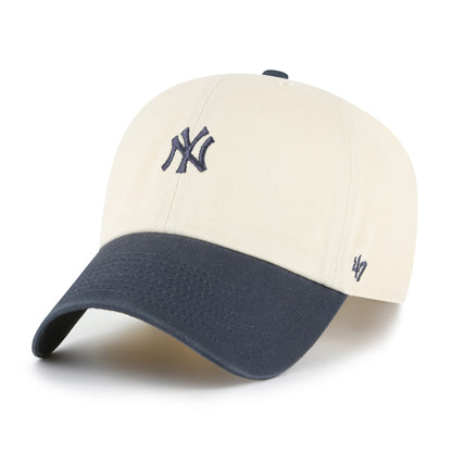 Pictured is this MLB New York Yankees Base Runner '47 CLEAN UP cap in natural and vintage navy. 1