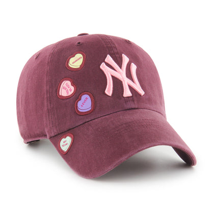 Pictured is this MLB New York Yankees Candy Heart '47 CLEAN UP cap in dark red. 2