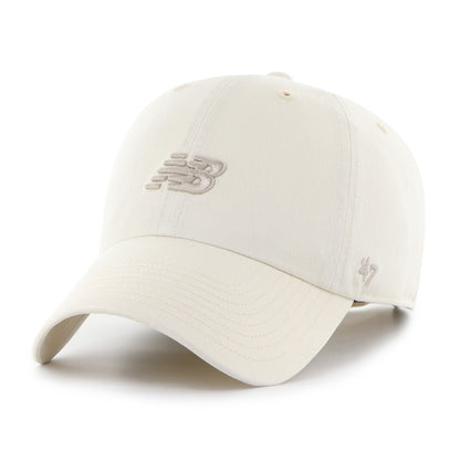 Pictured is this New Balance Core '47 CLEAN UP cap in cream. 1