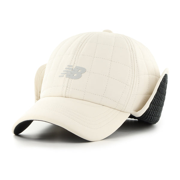 Pictured is this New Balance BRRR Pro Earflap ’47 CLEAN UP cap in light beige. 3
